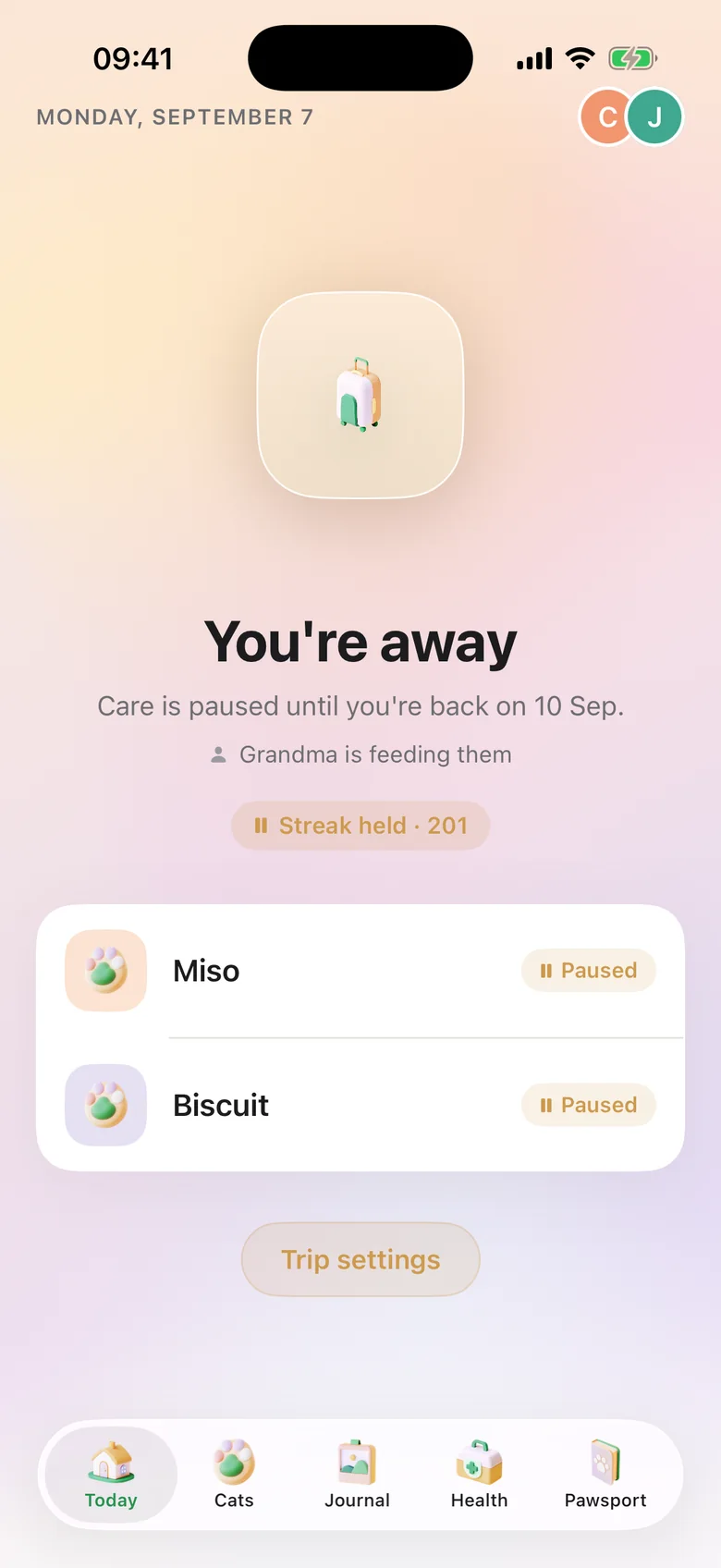 The You're away screen: care is paused until September 9, the streak is held at 201, and both cats show a Paused badge