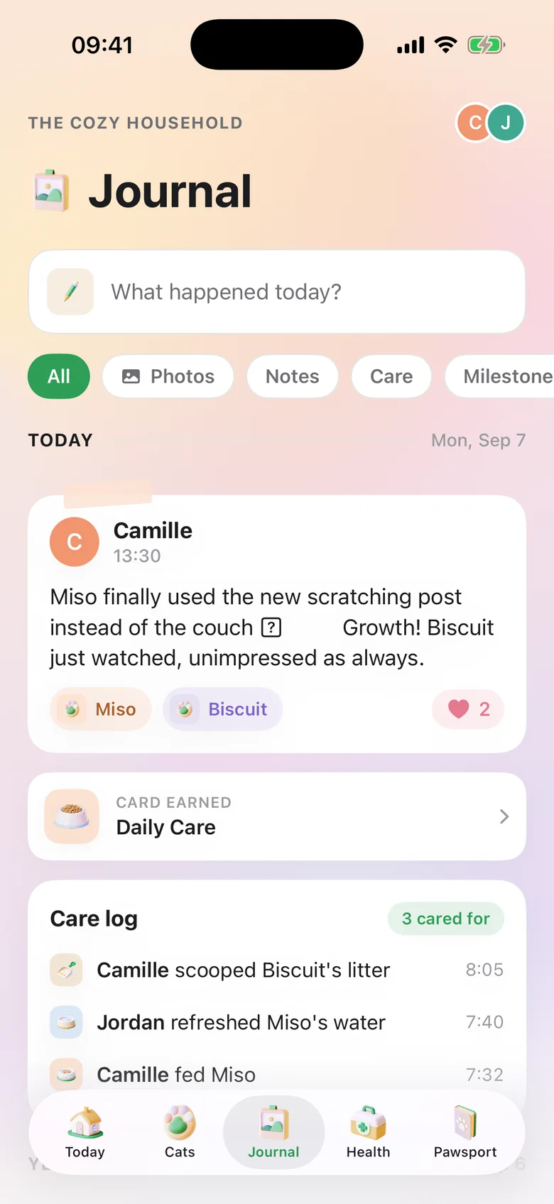 The Journal screen: a note from Camille about Miso using the new scratching post, tagged with both cats, above the day's care log